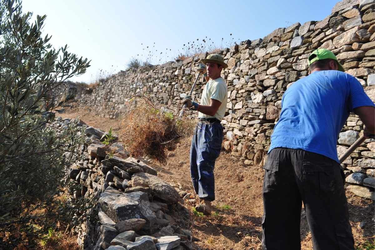 Local workers clearing a stone built trail on the island of Sifnos