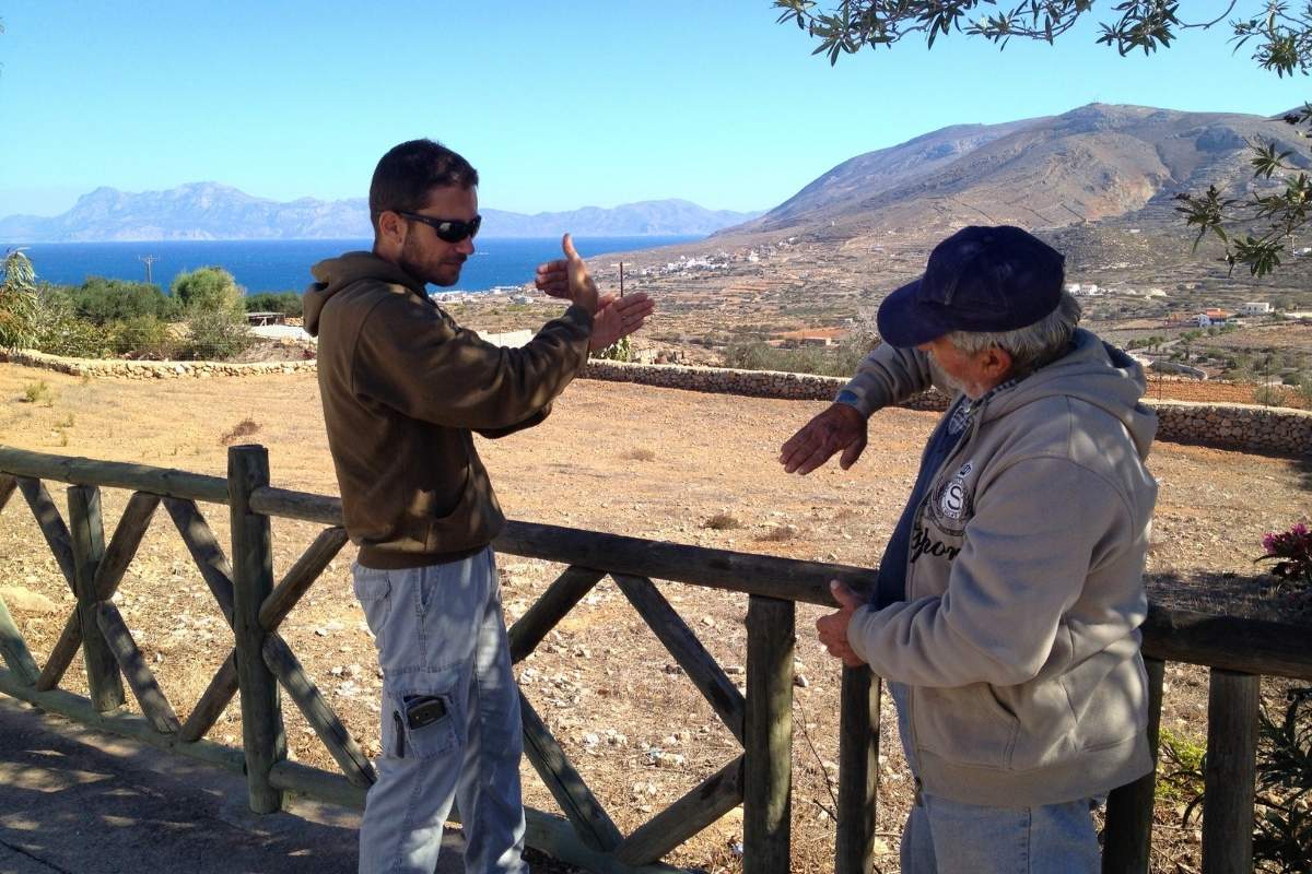 Two people talking about trails on the island of Kasos