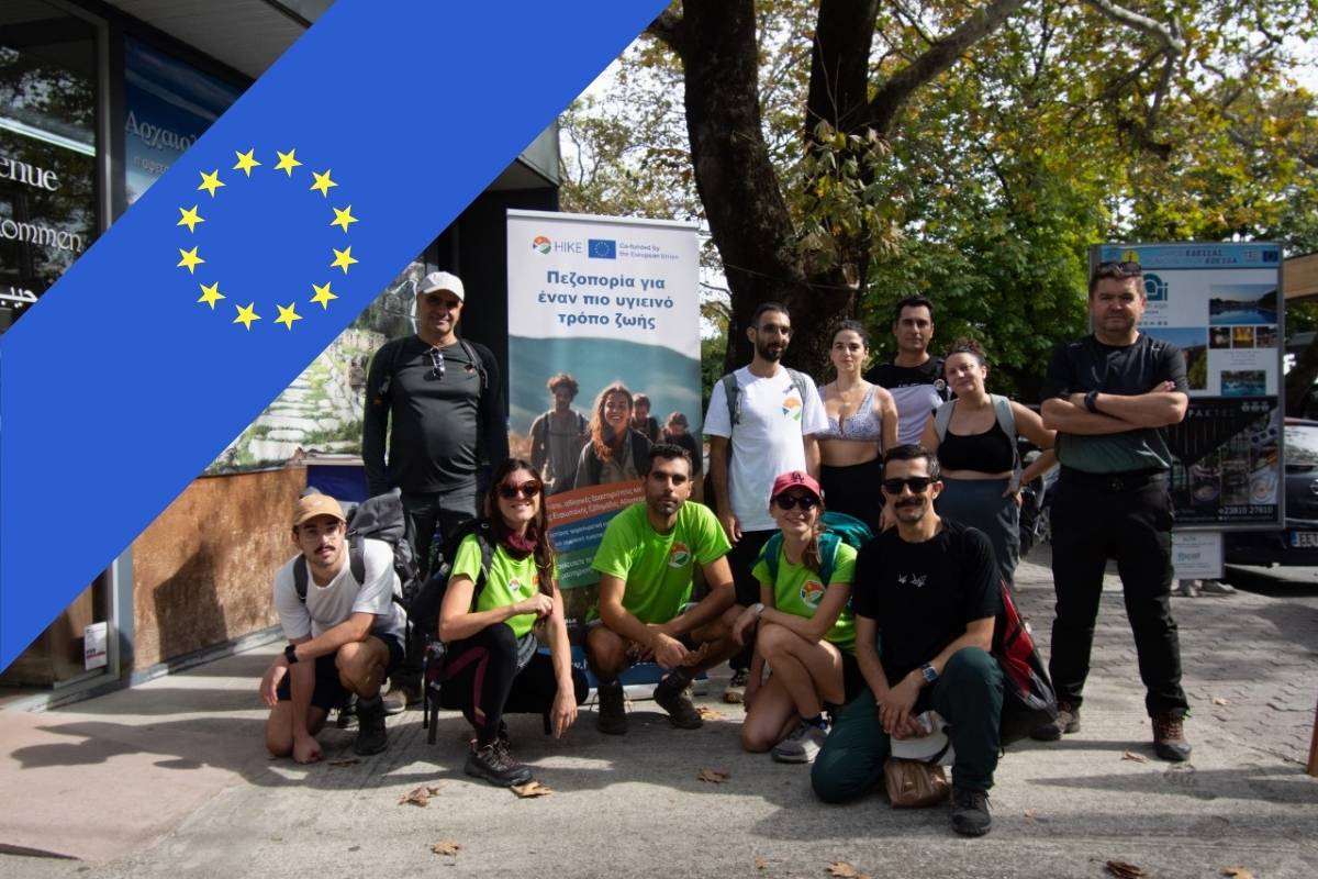 Participants of an EU programme posing for a group photo outside of the tourism office in Edessa, Greece